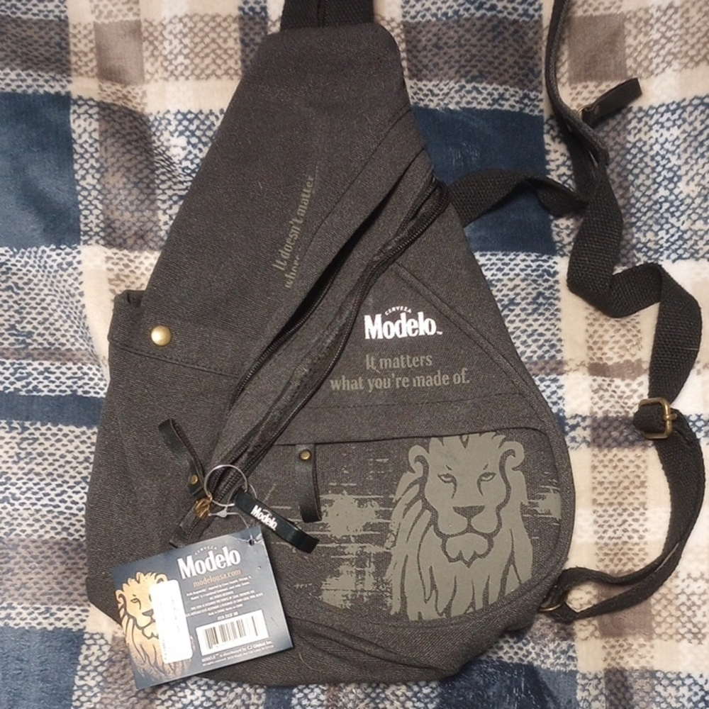 ModelCo Charcoal Sling Backpack with Lion Design